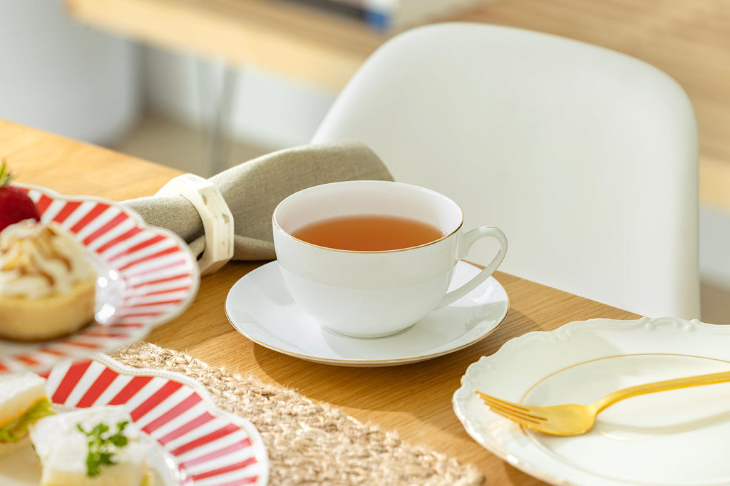 Gold Rim Blanc Bone China Cup and Saucer