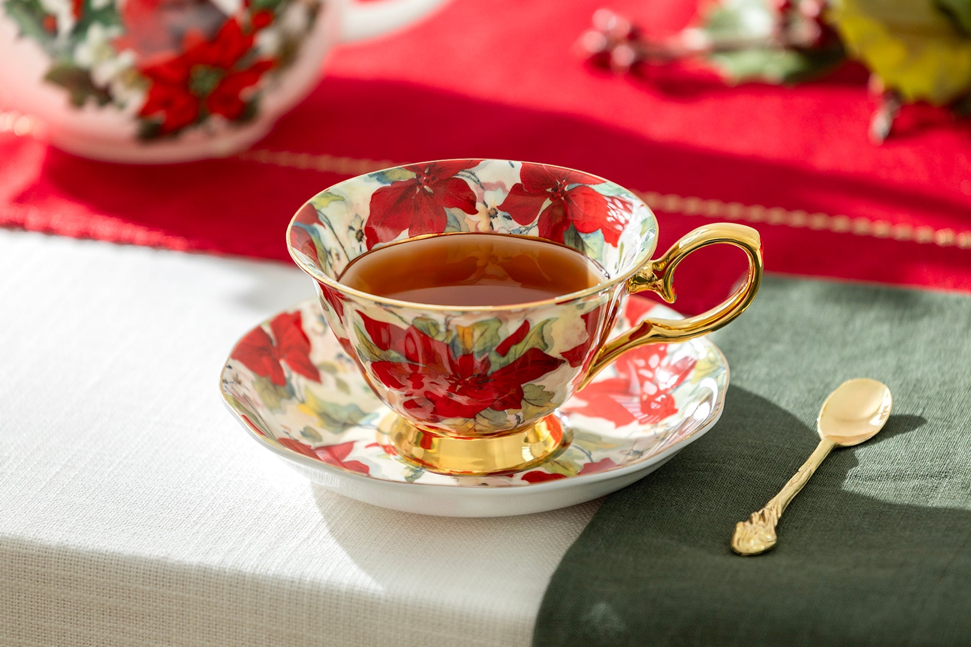 Poinsettia Gold Bone China Tea Cup and Saucer
