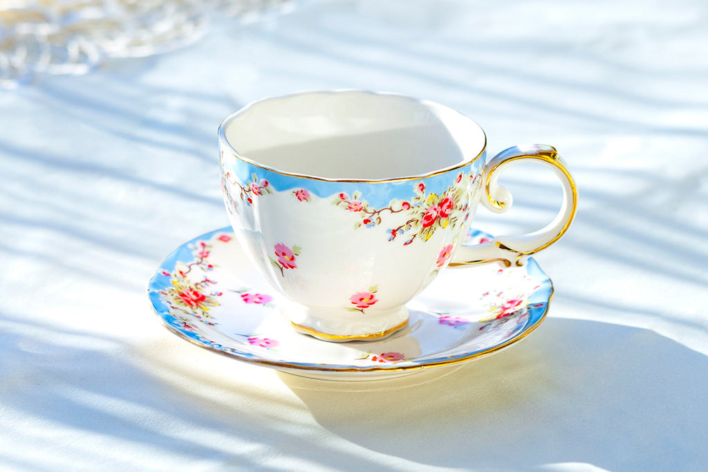 Rose with Blue Accent Fine Porcelain Tea Cup and Saucer