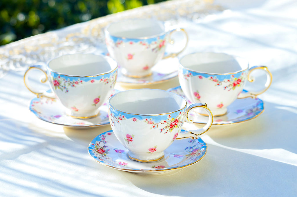 Rose with Blue Accent Fine Porcelain Tea Cup and Saucer
