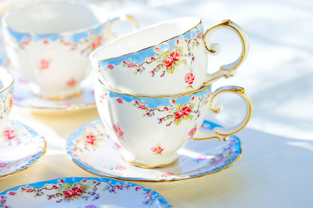 Rose with Blue Accent Fine Porcelain Tea Cup and Saucer