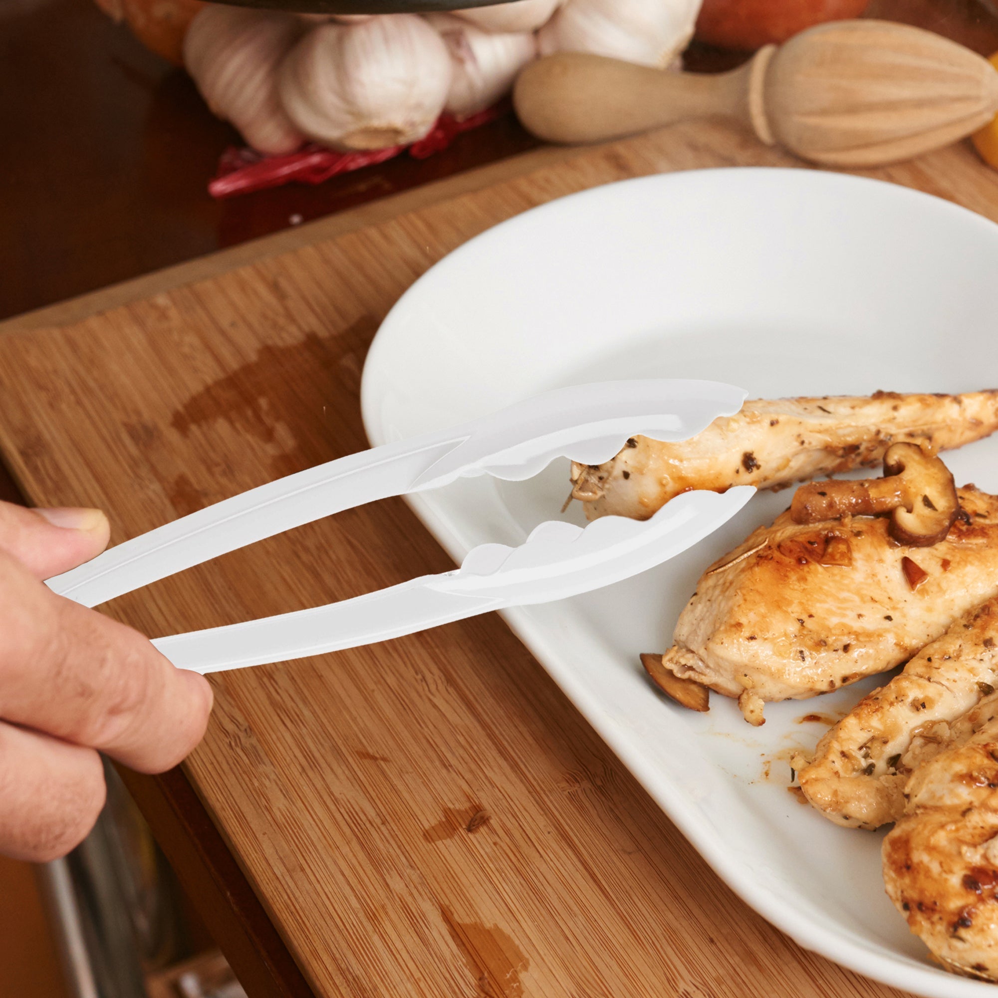 9" White Disposable Plastic Serving Tongs
