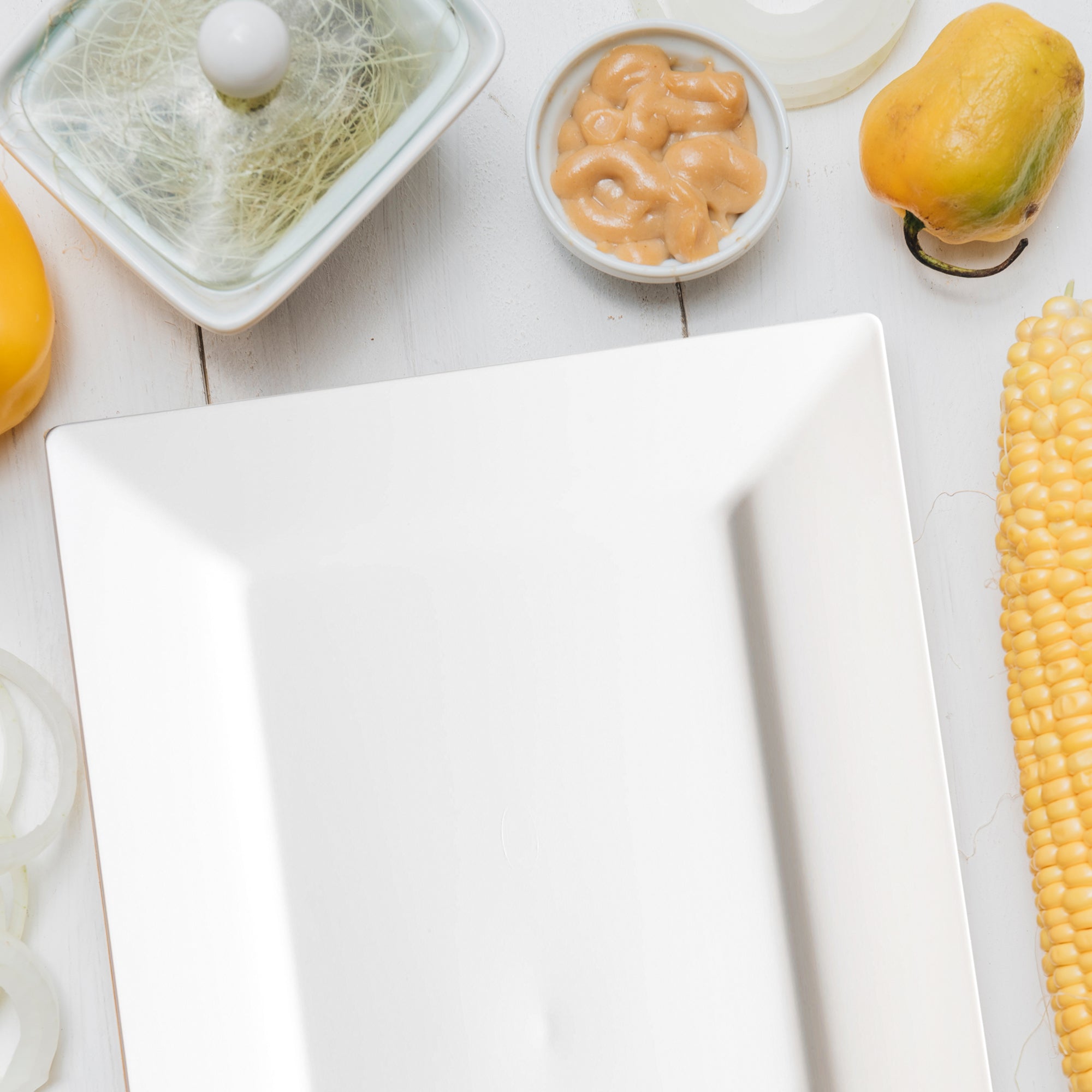White Rectangular Plastic Dessert Plates (5.5" x 8.5")