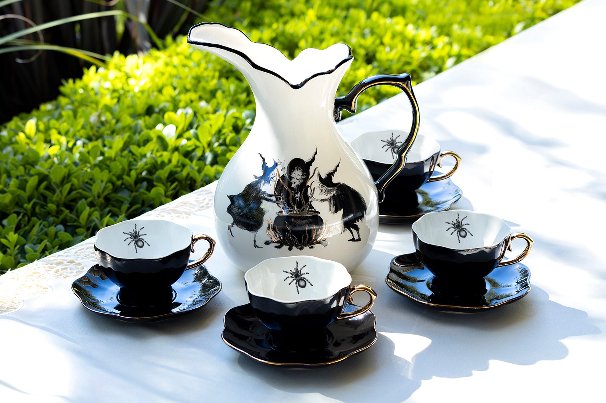 Witches Brew Pitcher + 4 Spider Tea Cup and Saucer Sets